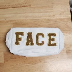 White Cosmetic Bag with Gold Accents